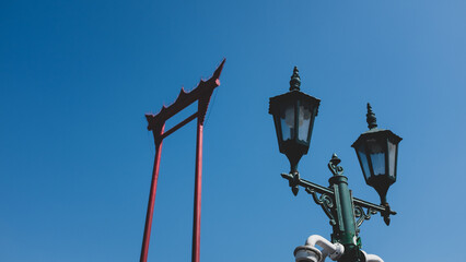 A beautiful lamp with red gate that creates architecture view
