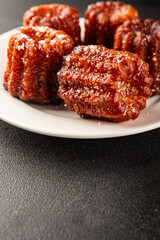 Canneles sweet dessert french cuisine sweets fresh delicious gourmet food background on the table rustic food top view copy space