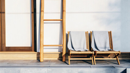 A serene minimalist patio features two wooden chairs with light throws. A bamboo ladder stands beside them, complementing the bright building facade.   © Logos