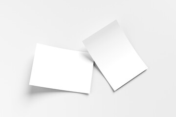 Two A4 white paper, flyer, notebook for mockup isolated on gray background