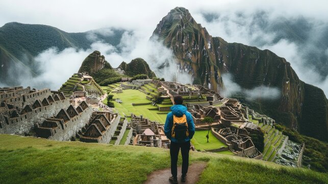 Traveler at ancient ruins, misty mountains