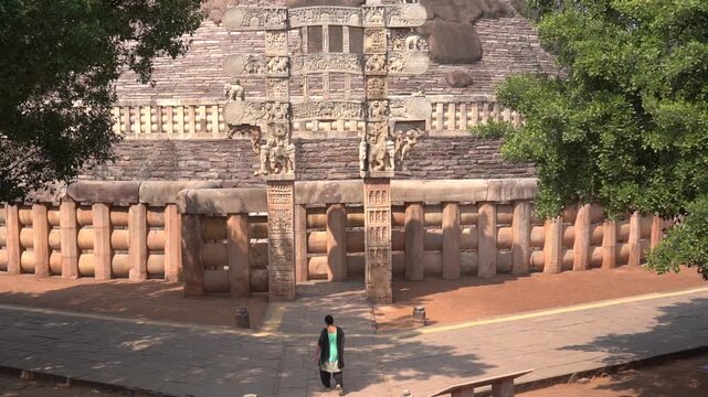 Woman tourist visit to the Sanchi Stupa, UNESCO World Heritage Site, Madhya Pradesh, India.