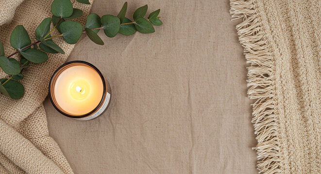 Minimal Flat Lay with Candle, Eucalyptus, Beige Linen and Knitted Fabric&ndash; Soft Neutral Boho Aesthetic