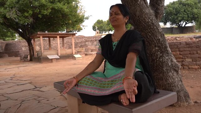 Woman tourist visit to the Sanchi Stupa, UNESCO World Heritage Site, Madhya Pradesh, India