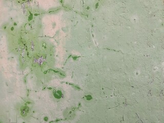 Close up of grunge old wall weathered with peeling paint texture background 