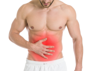 A muscular man holding his stomach, indicating discomfort or pain in the abdominal area.
