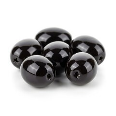 Glossy black olives grouped together isolated on white background