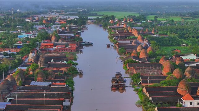 Aerial view of Mang Thit brick kiln in Vinh Long. Burnt clay bricks used in traditional construction of Vietnamese, Mekong Delta, Vinh Long province, Vietnam