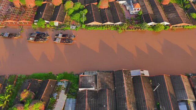 Aerial view of Mang Thit brick kiln in Vinh Long. Burnt clay bricks used in traditional construction of Vietnamese, Mekong Delta, Vinh Long province, Vietnam