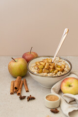 Oatmeal Porridge with Caramelized Apples and Cinnamon. Autumn Breakfast