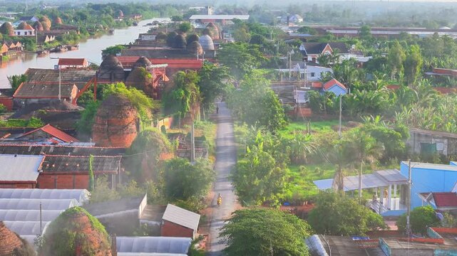 Aerial view of Mang Thit brick kiln in Vinh Long. Burnt clay bricks used in traditional construction of Vietnamese, Mekong Delta, Vinh Long province, Vietnam