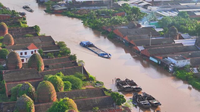 Aerial view of Mang Thit brick kiln in Vinh Long. Burnt clay bricks used in traditional construction of Vietnamese, Mekong Delta, Vinh Long province, Vietnam