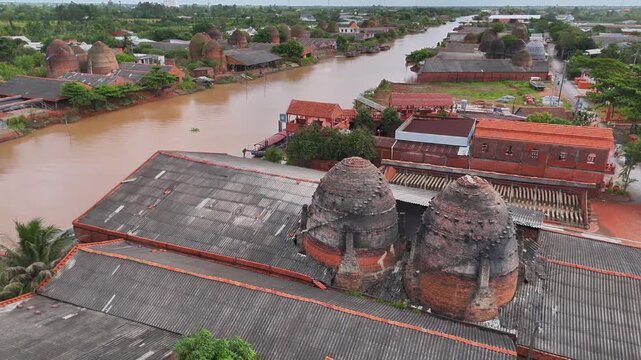 Aerial view of Mang Thit brick kiln in Vinh Long. Burnt clay bricks used in traditional construction of Vietnamese, Mekong Delta, Vinh Long province, Vietnam