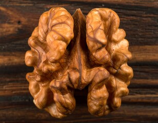 Walnut halves on wooden surface