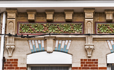 Details of the ceramic decoration on the facade of an old seaside villa in the town of...