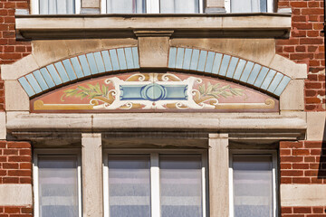 Details of the ceramic decoration on the facade of an old seaside villa in the town of...
