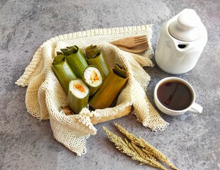 Arem-arem, a traditional Indonesian food made from rice filled with vegetables, chicken, meat or...