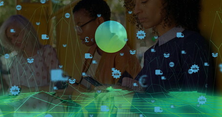 Female colleagues analyzing data in office, with wireframe grid, sphere and floating icons overlay