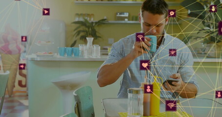 Drinking man in blue shirt scrolling smartphone while sipping coffee in café, with network overlay