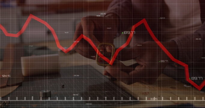 Inspecting craftsman measuring metal part at workbench with ruler and digital red line graph