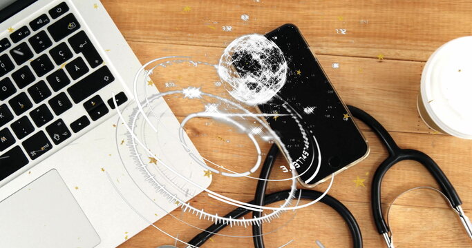 Smartphone projecting holographic globe on office desk, with laptop, stethoscope, coffee cup