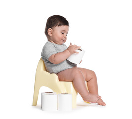Cute little baby sitting on potty with toilet paper against white background