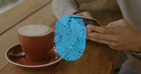 Holding smartphone Hispanic man leaning on wooden cafe table, with latte and fingerprint overlay