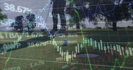 Golfer lining up putt with golf ball, putter in putting green, with candlestick stock ticker charts