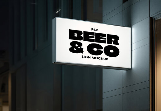 Lightbox Sign Mockup on Building at Night