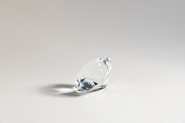 Aura. One beautiful diamond on light background