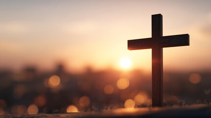 A wooden cross silhouette against a soft, warm sunset backdrop, a symbol of faith.
