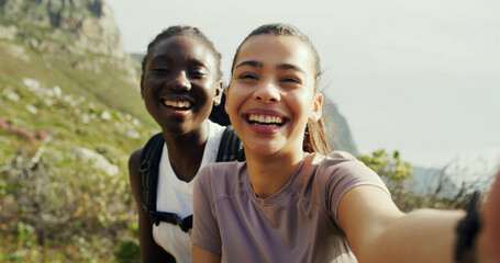 Women, friends and selfie for hiking, smile and portrait on mountain, live stream or excited in...