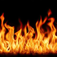 Abstract fiery flames against black background