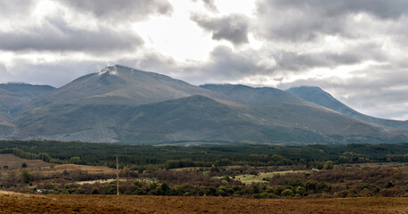 The Nevis Range from the Commando Memorial viewpoint above Spean Bridge to the north. Featuring Aonach Mor, Carn Mor Dearg, and Ben Nevis with it's summit under cloud.