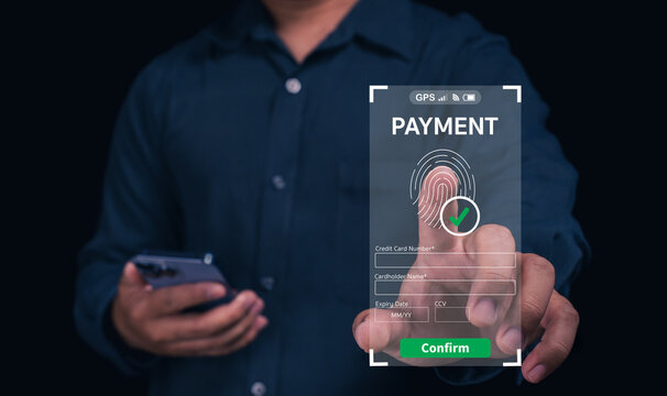 A person using a smartphone for biometric payment verification, showcasing a fingerprint scanning feature on a digital interface.