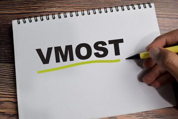 Concept of Vmost Analysis write on book isolated on Wooden Table.