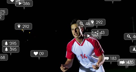 Soccer player gesturing at social metrics while reacting to incoming ball by heading at night - Powered by Adobe