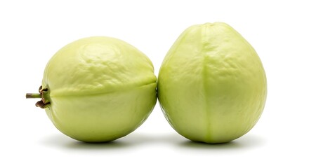 Fototapeta premium Two ripe green guavas on a white background