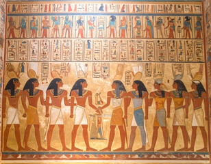 Mysterious ancient Egypt mural with hieroglyph art inside historic tomb. detailed wall painting showing pharaoh and god, sacred representation of Egyptian culture