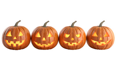 Four spooky jack o lanterns glowing with light isolated on transparent background