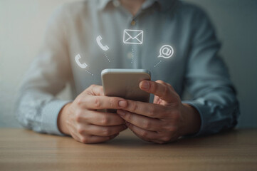 Person using smartphone with communication icons overlayed