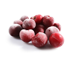 Pile of ripe frozen cherries isolated on white