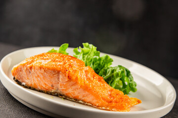 salmon fried fish seafood second course tasty snack fresh delicious gourmet food background on the...
