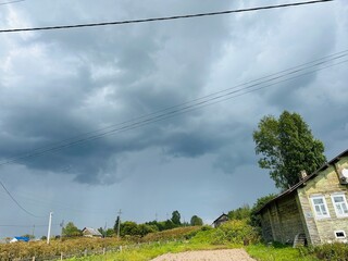high voltage power line before thunder storm