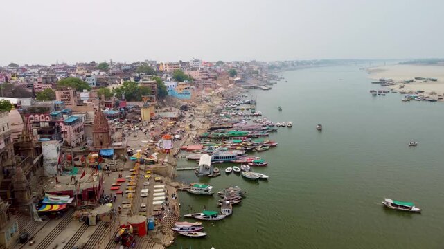 Drone Flying Towards the Ghats of Varanasi Along the Ganges River, India