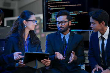 A diverse, multinational team of AI engineers including Indian, East Asian and Caucasian members...