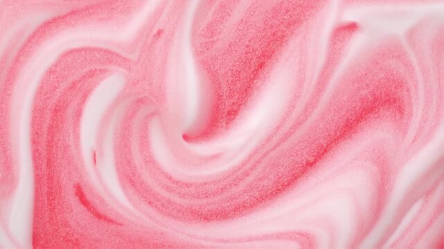Soft pink and white swirls blend together in a creamy, dreamy pattern, resembling strawberry milk or candy. The close-up highlights smooth textures and colors, evoking sweetness and a playful, artisti