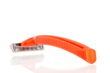 Disposable razor isolated on white background, close-up.