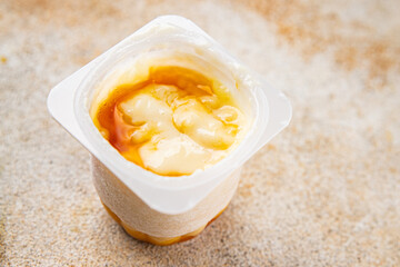 Rice pudding caramel syrup sweet dessert snack fresh delicious gourmet food background on the table...
