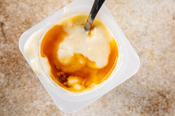 Rice pudding caramel syrup sweet dessert snack fresh delicious gourmet food background on the table...